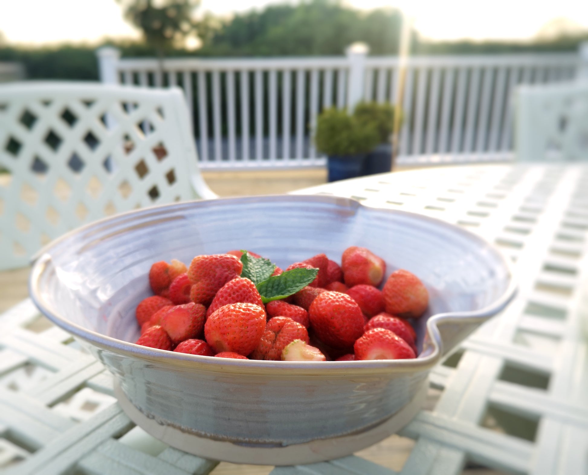 White salad Bowl with Strawberries . Made by Castle Arch Pottery